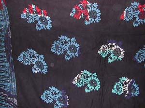 Tropical flower prints, ladies holiday clothing, batik sarongs, handcrafted wraps, indonesian style apparel, resort wear fashion